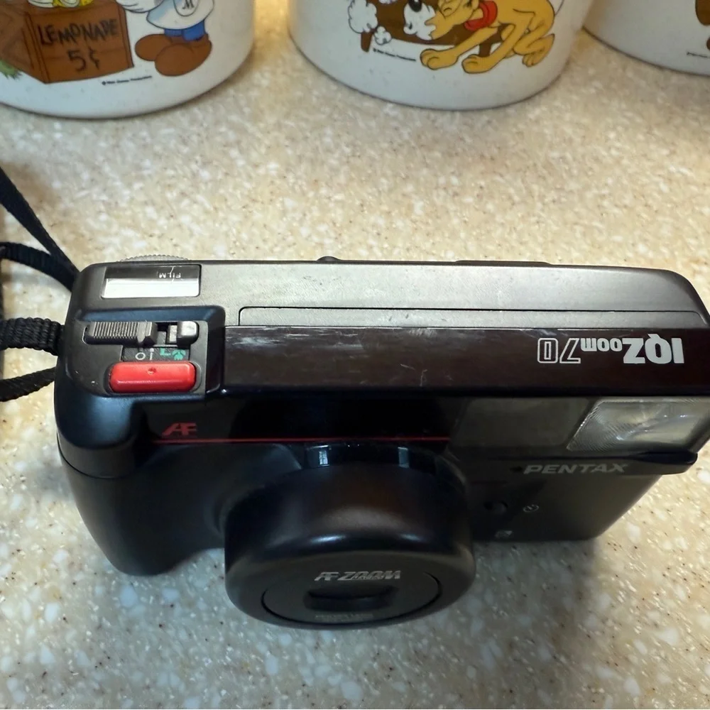 Pentax IQ Zoom 70 Black Macro 35mm Compact Point and Shoot with strap Camera
